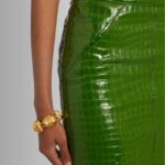 Close-up of details on the green leather skirt.