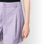 Close-up of purple leather shorts