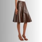 Side view of brown leather pleated skirt