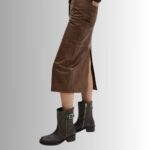 Side view of sleek brown leather midi skirt